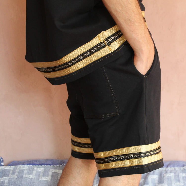 Right side view of the Kaizo-Ku Moroccan Heritage Black and Gold Caftan Shorts, showing the unique combination of contemporary style and classic Moroccan patterns. This side profile captures the versatility and elegance of the design.