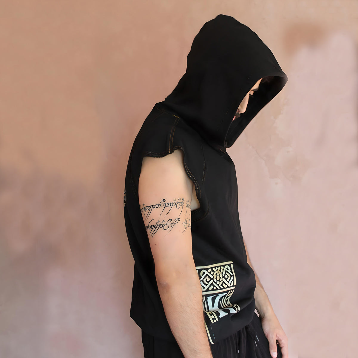 The left side view showcases the tank top's sleek design, highlighting the embroidered "Z" symbol—a nod to heritage—along with the hood for an added streetwear appeal.