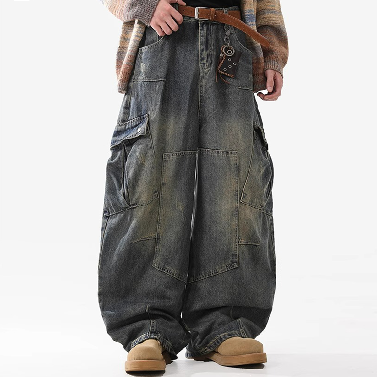 Model showcasing the relaxed wide-leg fit of the denim cargo pants in a casual outfit.