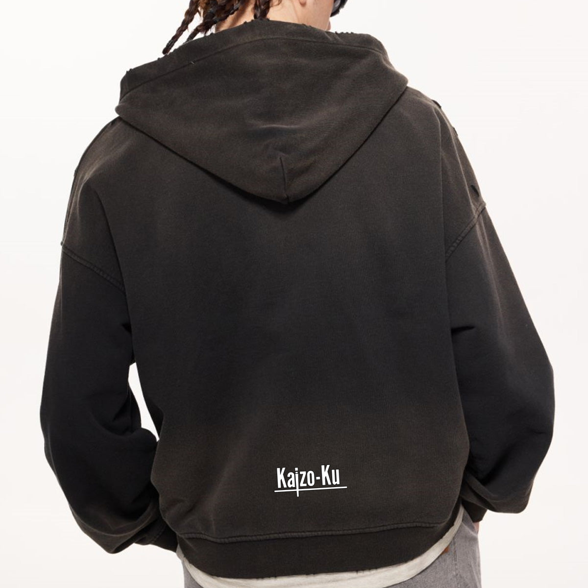  A side profile shot of a model wearing the Charcoal Gray Kaizo-Ku Vintage Hoodie, paired with dark denim for an urban-inspired outfit.