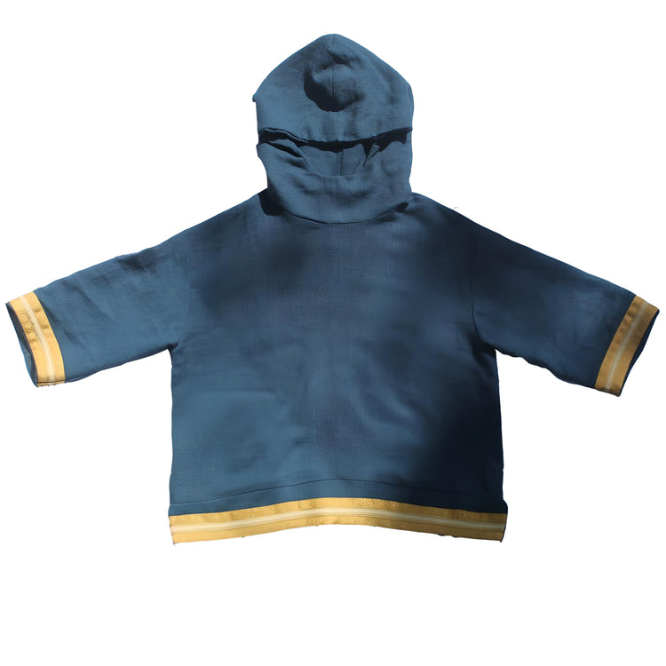 Front view of the hoodie displaying the rich blue linen material and the golden trims that add a touch of luxury.