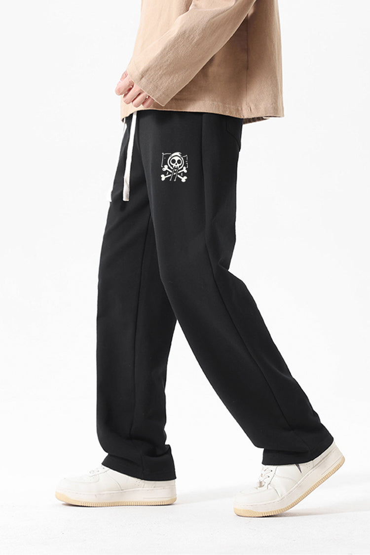 A side view showcasing the relaxed fit and smooth drape of the wide-leg sweatpants, styled effortlessly with a neutral top and sneakers.