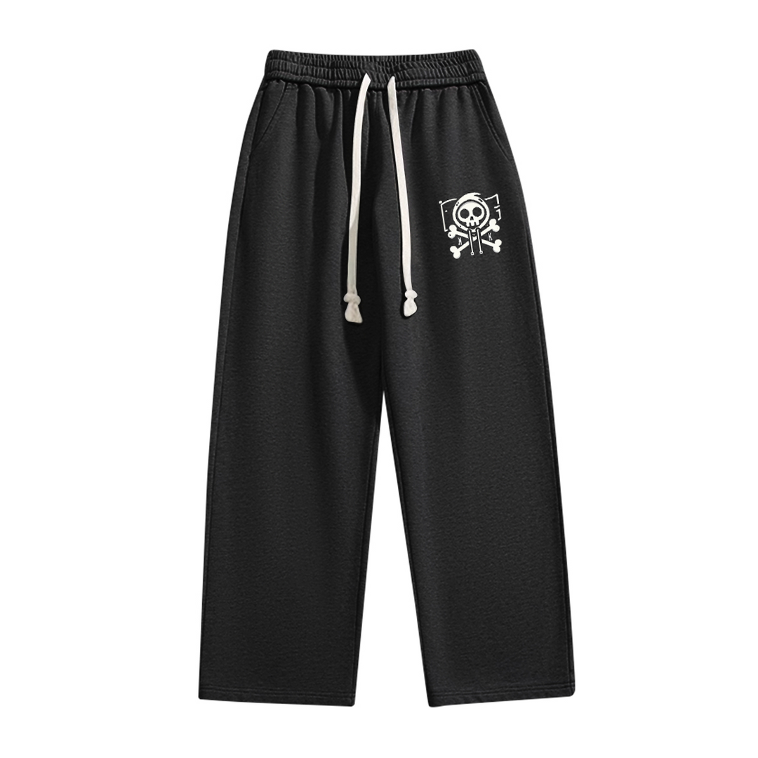 A front view of the black wide-leg sweatpants featuring a bold white skull print and drawstring waistband for an adjustable fit. Perfect for urban streetwear enthusiasts.