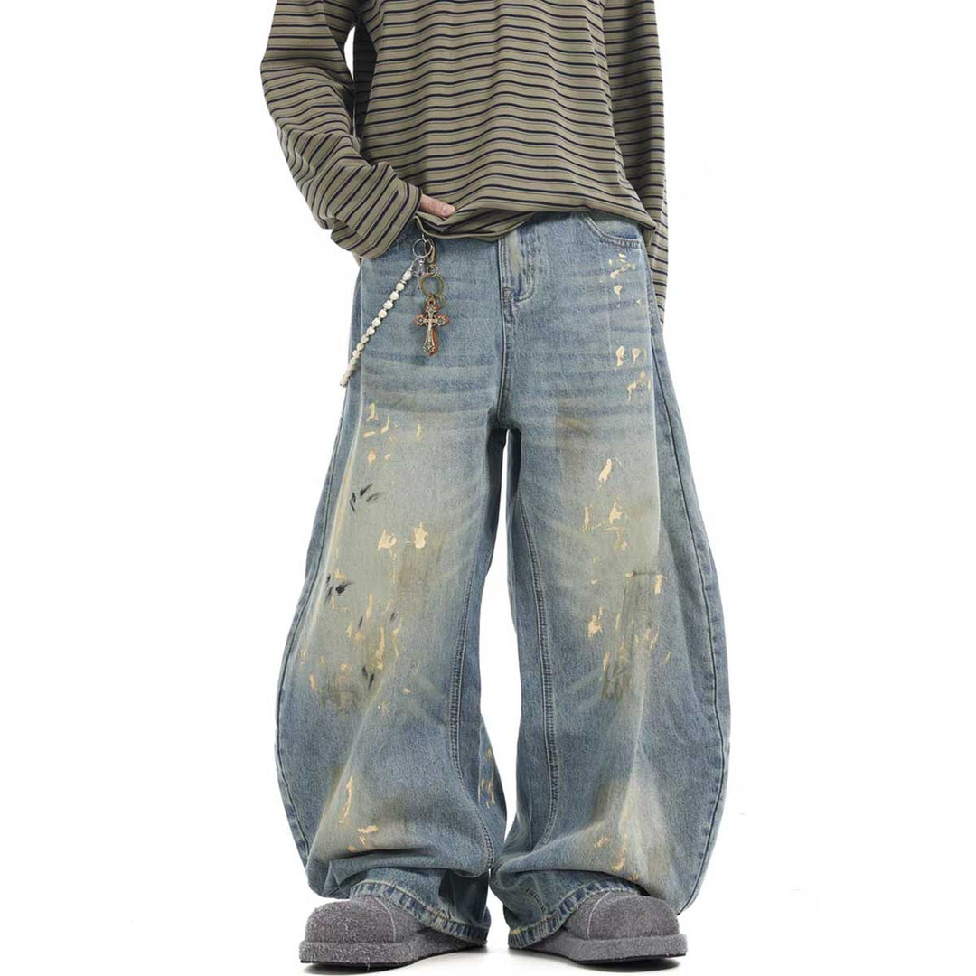 A front view of wide-leg baggy jeans, featuring modern detailing and a loose, relaxed fit for ultimate comfort and style.