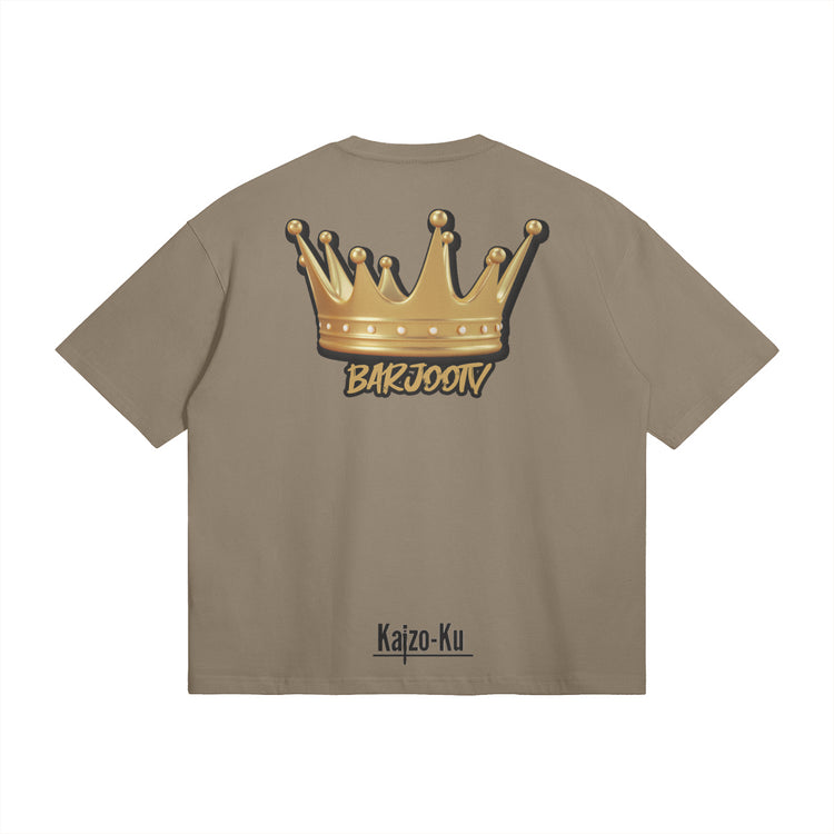 Back view of the Barjoo_Tv Oversized T-shirt in light brown, showcasing the iconic golden crown graphic.