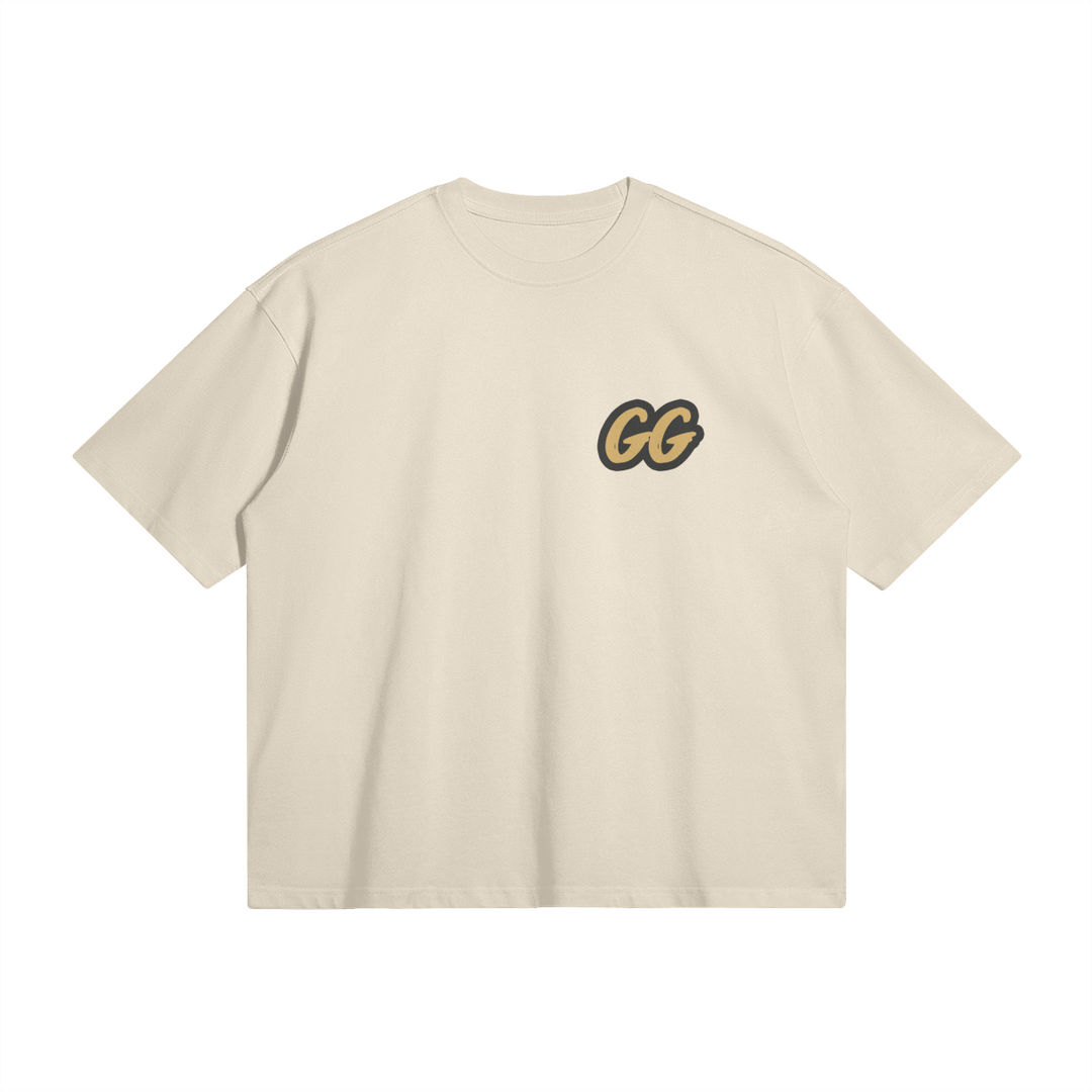 Front view of the Barjoo_Tv Oversized T-shirt in beige, featuring the sleek "GG" emblem.