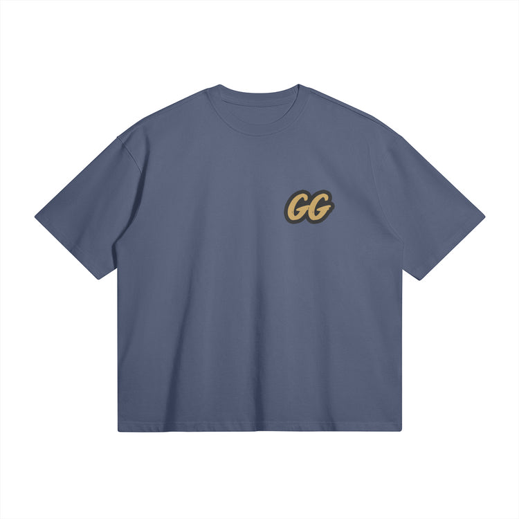 Front view of the Barjoo_Tv Oversized T-shirt in gray, featuring the sleek "GG" emblem.