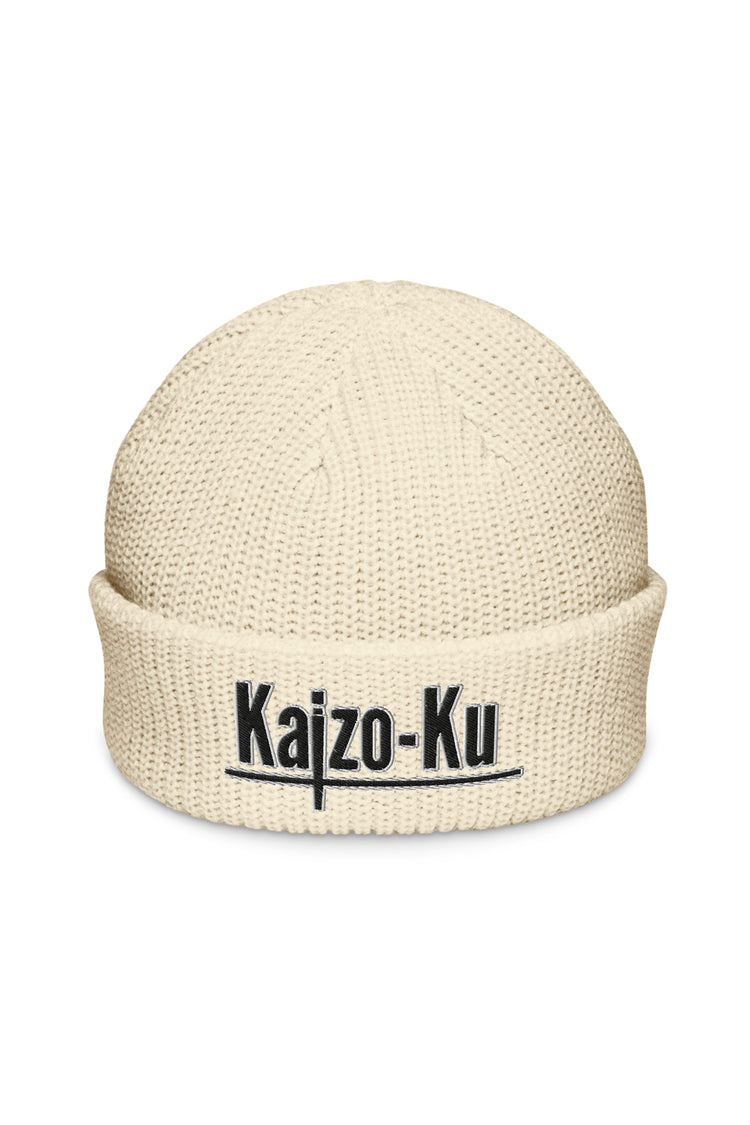 Front view of the Kaizo-Ku Fisherman Beanie in Ecru, displaying the embroidered Kaizo-Ku logo on the cuff, crafted with a high-quality knit for a cozy, stylish look.