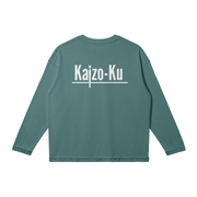 The Gray Green Long Sleeve T-Shirt, viewed from the back, showcases a relaxed, oversized fit that's both trendy and comfortable for any occasion.