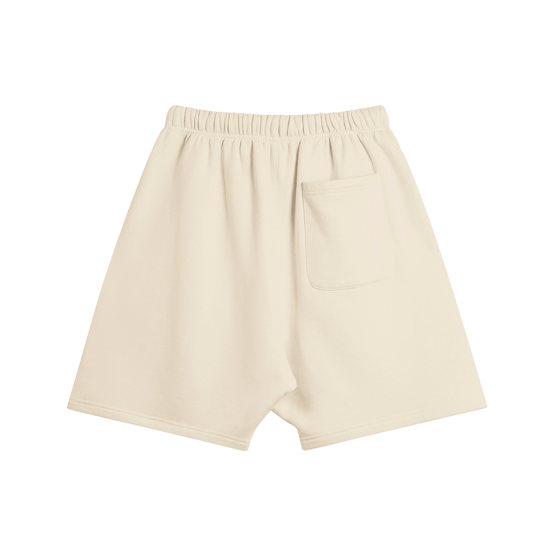 Back view of the Kaizo-Ku Oversized Moroccan-Inspired Shorts in beige, ideal for a cool, relaxed summer look.