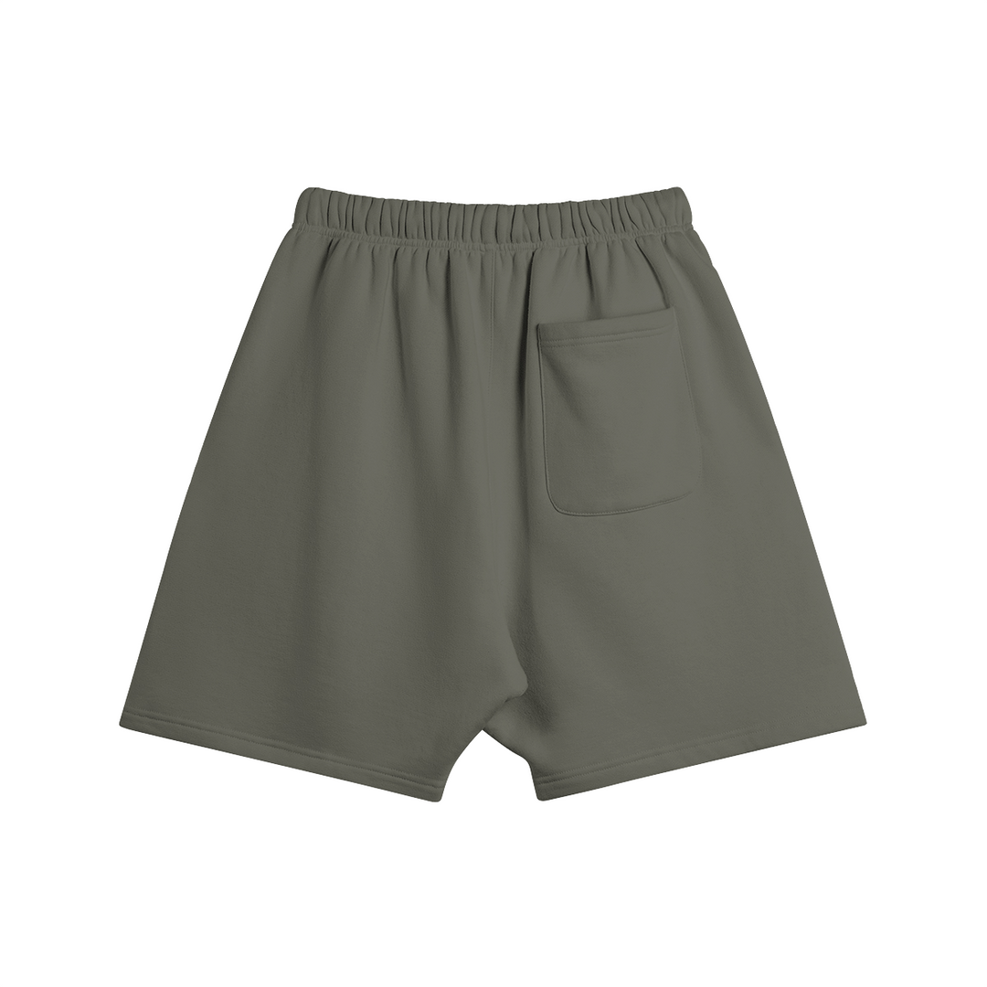 Back view of the Kaizo-Ku Oversized Moroccan-Inspired Shorts in dark grey, perfect for a stylish summer look.