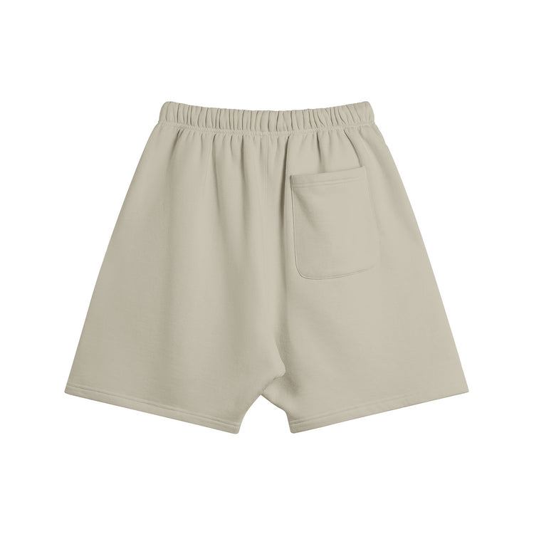 Back view of the Kaizo-Ku Oversized Moroccan-Inspired Shorts in grey, highlighting the clean, simple style.