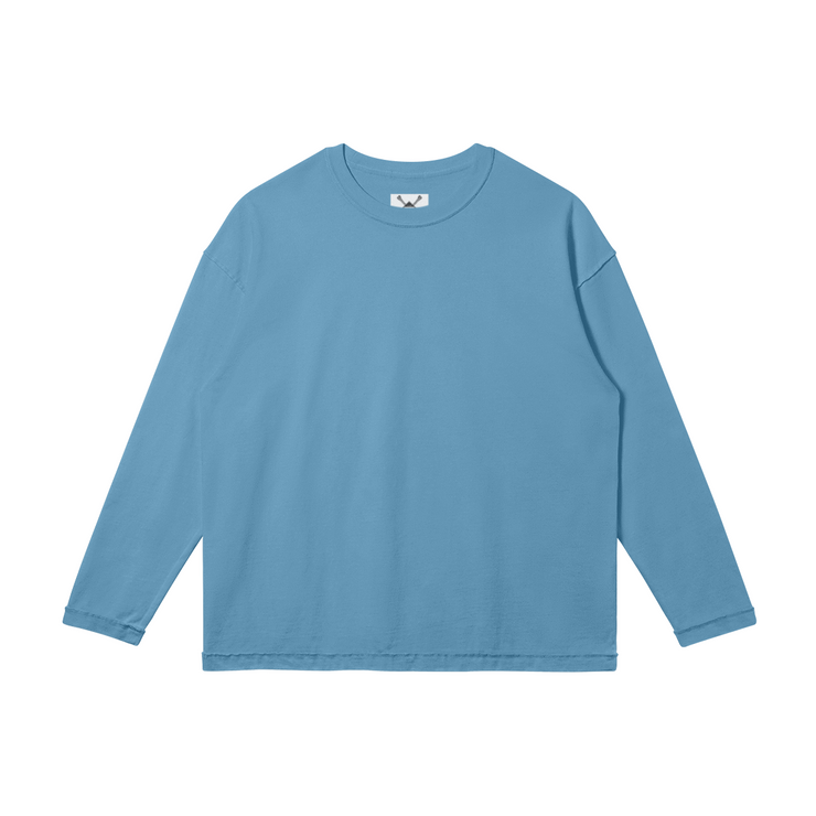 The Medium Blue Oversized Long Sleeve T-Shirt shines in our Spring 2024 collection, offering a perfect blend of vintage charm and modern comfort.