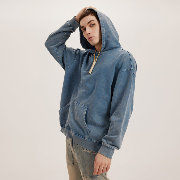 Showcased by our model, the Shadow Blue Oversized Vintage Hoodie combines relaxed vintage vibes with the laid-back sophistication of oversized design.