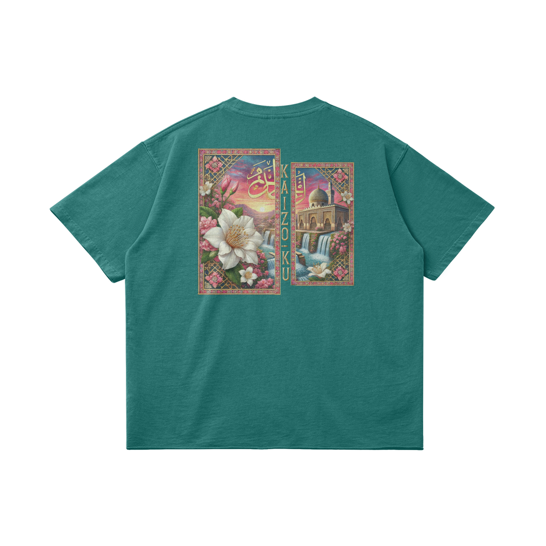 Back view of the Moroccan Sunset Oversized T-Shirt in green, showcasing a detailed Moroccan-inspired sunset and floral print with Arabic calligraphy.