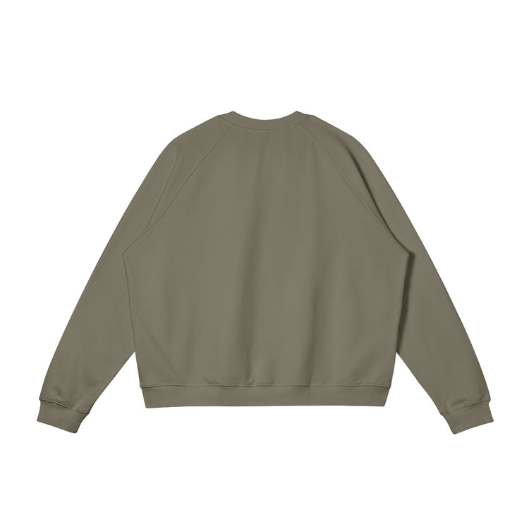 Back view of the Kaizo-Ku oversized sweatshirt in Camel. A relaxed, oversized fit that brings comfort and style together.