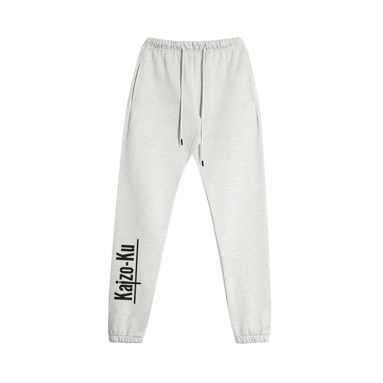 Flat front view of the Kaizo-Ku oversized jogger in grey. Features a relaxed fit with side pockets and an adjustable waistband for ultimate comfort.