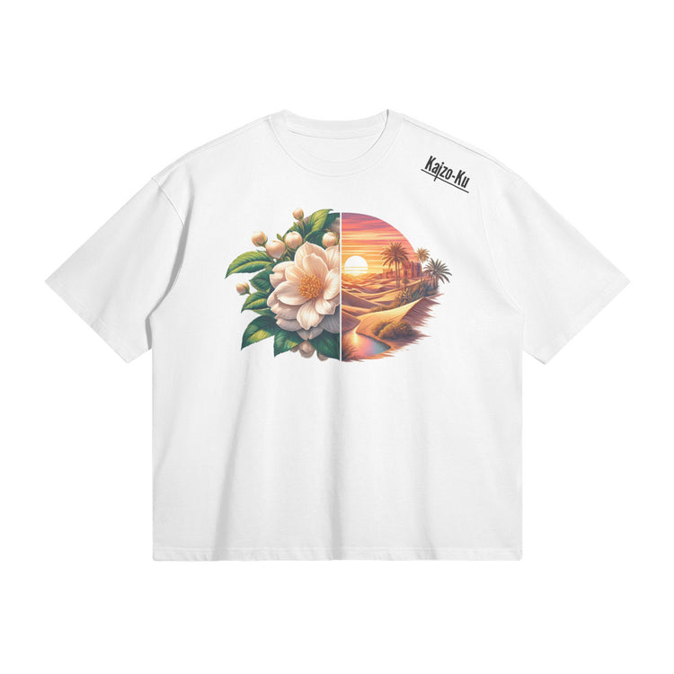 The front of the t-shirt displays a beautiful, oversized design with a flower on the left side and a scenic Moroccan sunset on the right side. The brand name "Kajzo-Ku" is subtly placed on the shoulder.