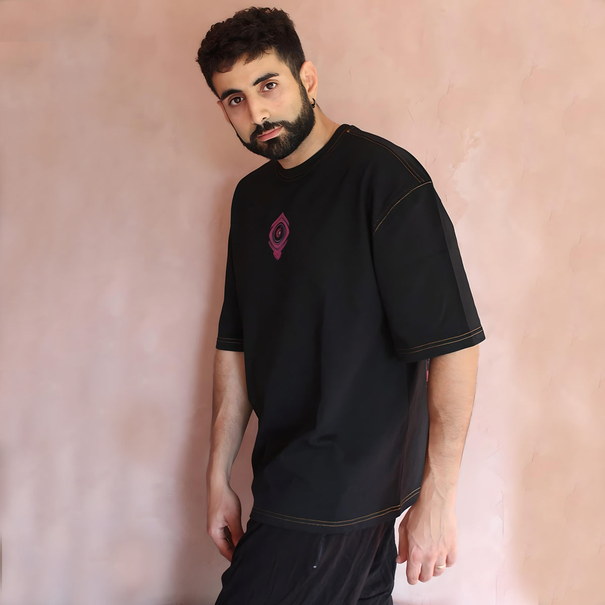 Showcase your style with the Sunny Blossom Oversized Black T-Shirt, featuring intricate graphics on the left side. This piece is designed for those who live and breathe urban streetwear, offering both comfort and flair. Its oversized silhouette provides a relaxed fit, perfect for everyday wear or standout street style.