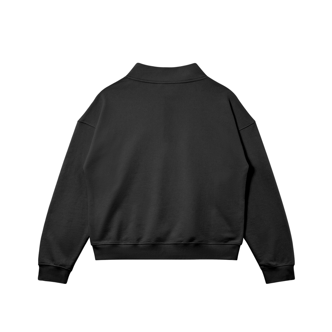 Flat back view of the Kaizo-Ku zip collar sweater in Black. Oversized fit for a relaxed streetwear look, ideal for layering.