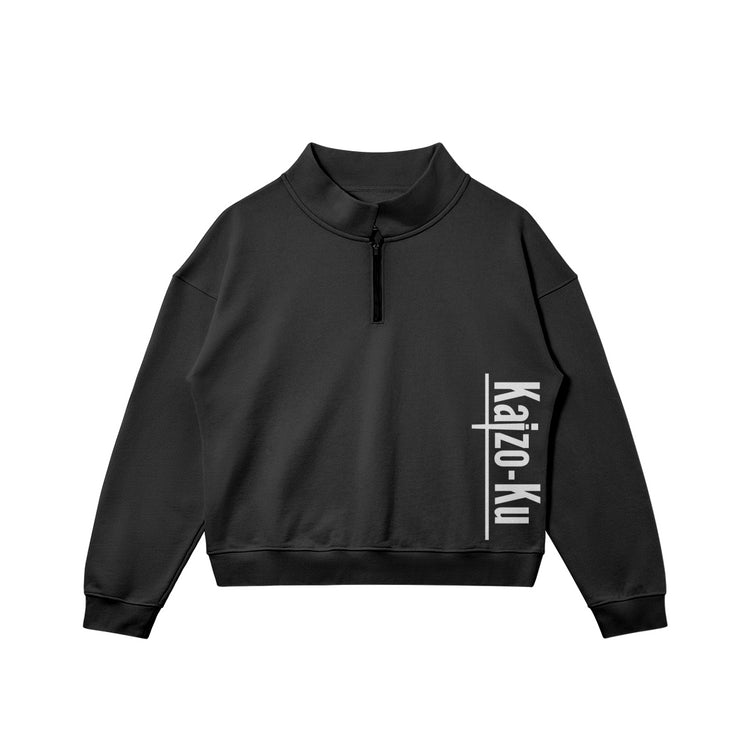 Kaizo-Ku black half-zip sweatshirt, oversized fit, with white Kaizo-Ku logo on the side.